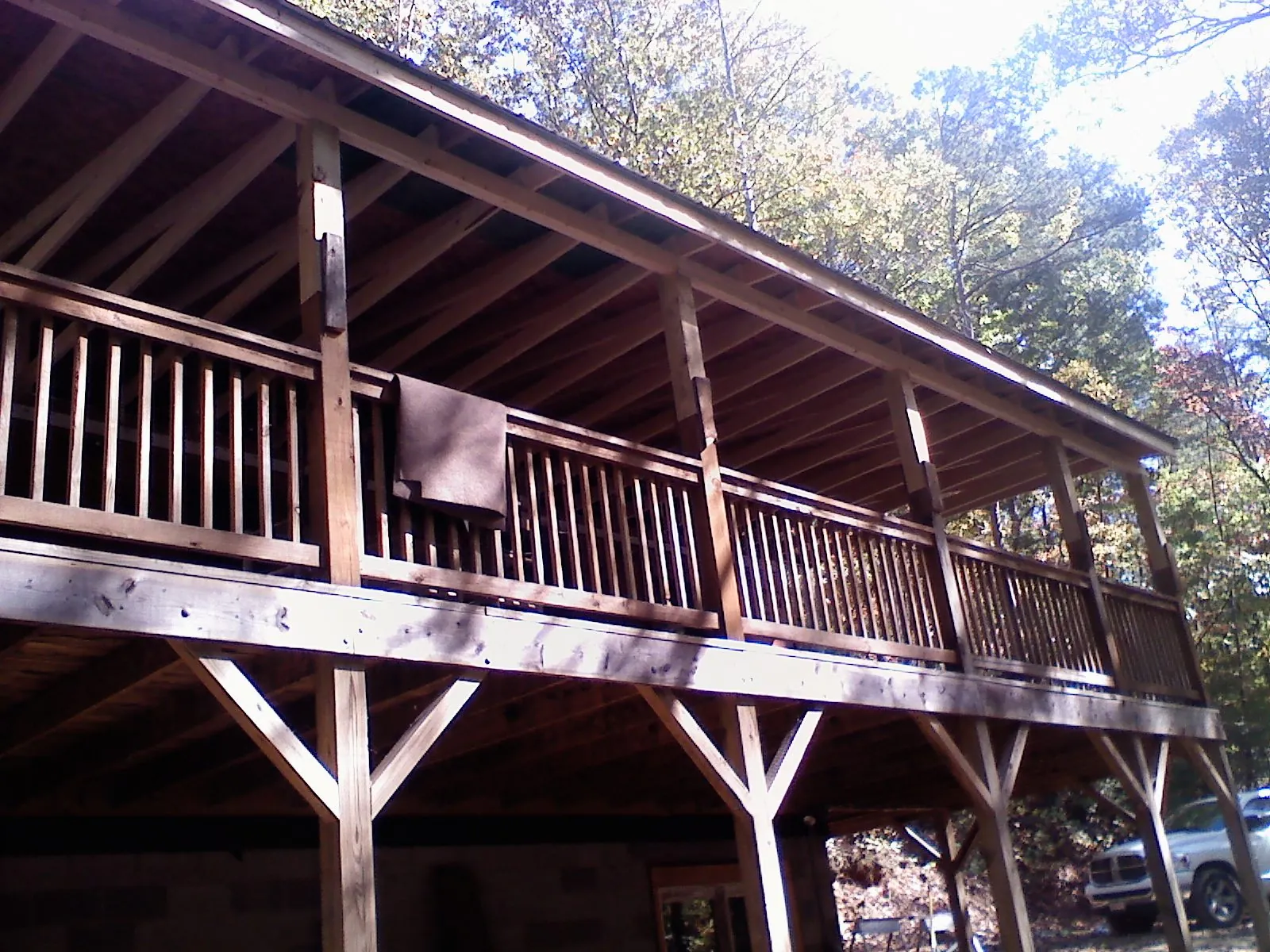 Timber framing under a new elevated porch and deck — Roof Leak Repair in Ixonia by Roofing Brothers